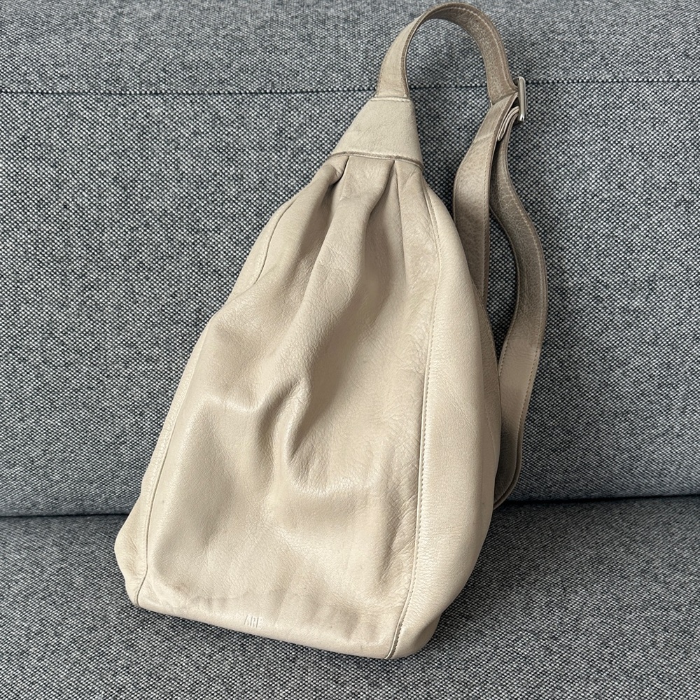 Are Studio Leather hobo pack pack 
Pre-owned with lots of life left